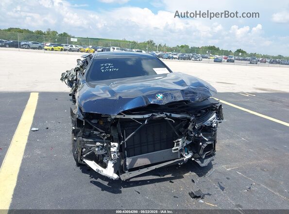 WBAGV2C03NCJ85591 2022 BMW 8 SERIES Черный Вид спереди