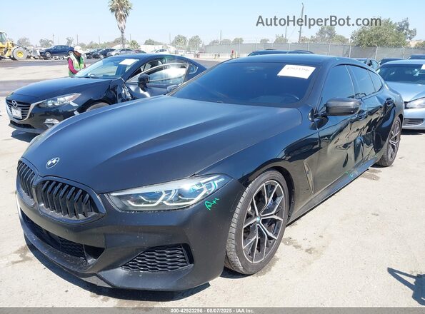 WBAGV8C01LBP48773 2020 BMW M8 Black წინა მარცხენა ხედი სამი მეოთხედიდან