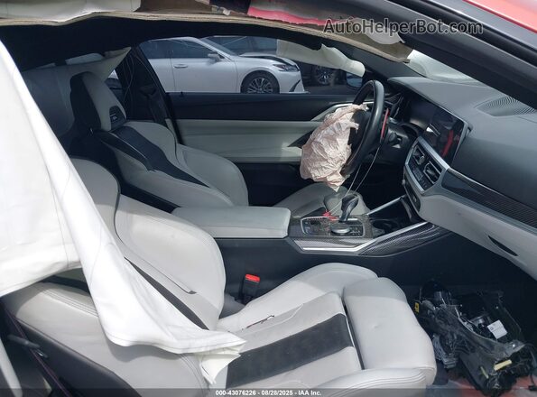 WBS33AZ00PCL82612 2023 BMW M4 Orange Vista interior delantera