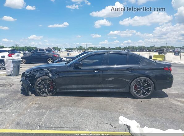 WBS83CH00PCL81205 2023 BMW M5 Black Widok wnętrza z tyłu