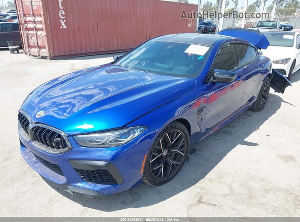 WBSGV0C08PCM46037 2023 BMW M8 Синий Передняя левая четверть
