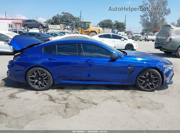 WBSGV0C08PCM46037 2023 BMW M8 Синий Вид задней части салона