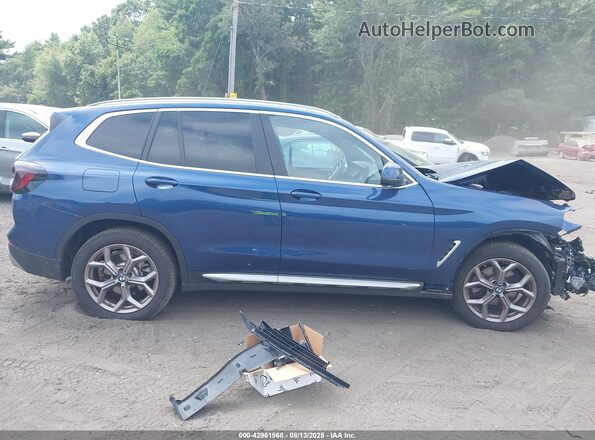 WBX57DP08RN297326 2024 BMW X3 Blue Սալոնի հետևի տեսք