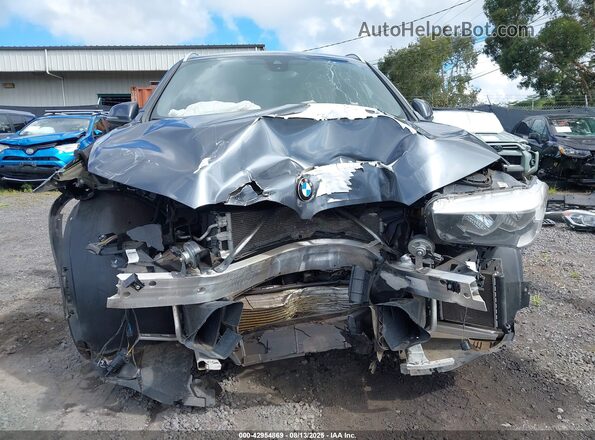 WBXHT3C5XK3H35594 2019 BMW X1 Gray Widok wnętrza z tyłu