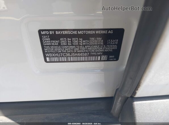 WBXHU7C36J5H44587 2018 BMW X1 White Engine compartment view