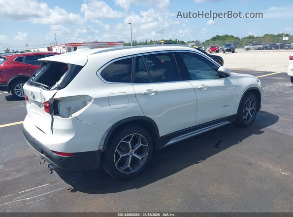 WBXHU7C36J5H44587 2018 BMW X1 White Rear right