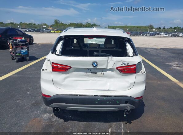 WBXHU7C36J5H44587 2018 BMW X1 White 