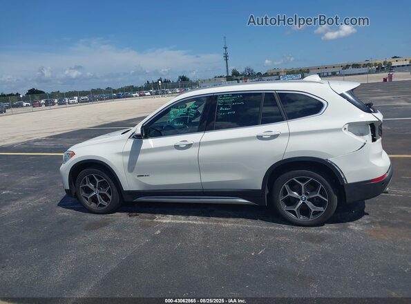 WBXHU7C36J5H44587 2018 BMW X1 White 