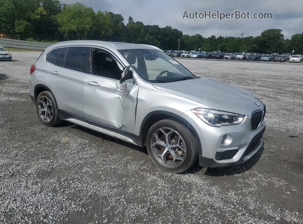 WBXHU7C39J5L08152 2018 BMW X1 Серебряный 