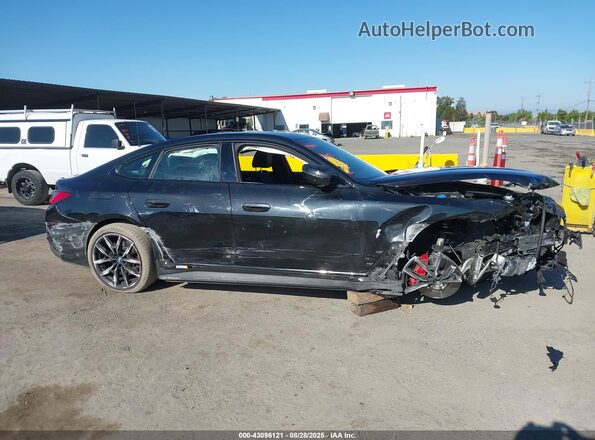 WBY33AW09RFT41259 2024 BMW I4 Black Вид задньої частини салону