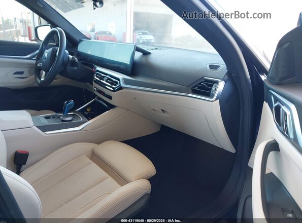 WBY43AW09PFP53618 2023 BMW I4 Blue Vista interior delantera