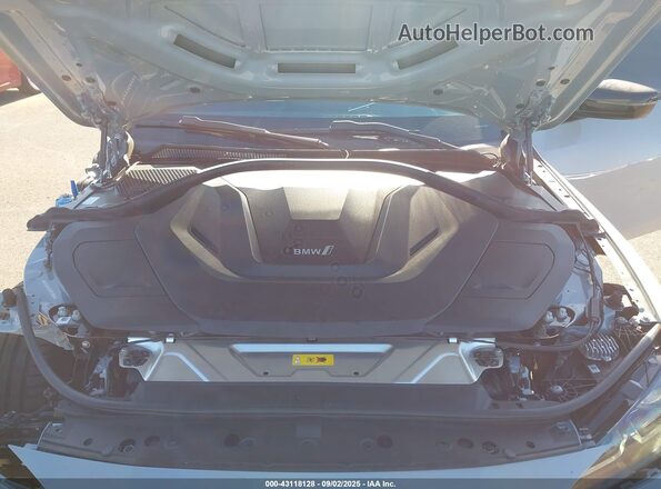 WBY43AW0XRFS73655 2024 BMW I4 Gray Vista trasera
