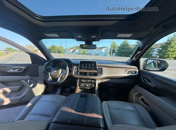 1GNSCNKD0MR124906 2021 CHEVROLET TAHOE Brown Հետևի նստատեղերի տեսք