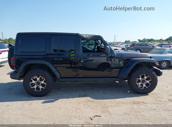 1C4HJXFN4MW524282 2021 JEEP WRANGLER UNLIMITED Black Widok wnętrza z tyłu