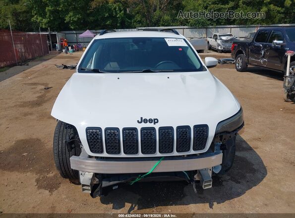 1C4PJLLB9MD174156 2021 JEEP CHEROKEE White Rear interior view