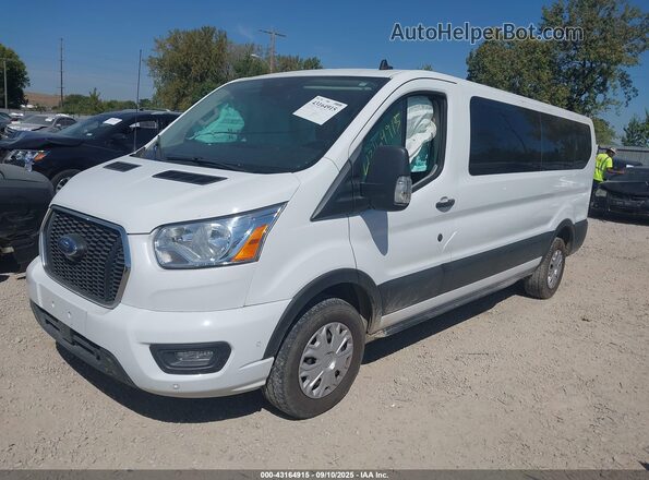 1FBAX2Y87MKA32304 2021 FORD PASSENGER White წინა მარცხენა ხედი სამი მეოთხედიდან