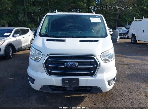 1FBAX2YG5LKA45932 2020 FORD PASSENGER White Вид панелі приладів