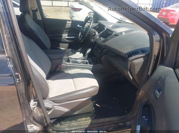 1FMCU9GD2KUB38242 2019 FORD ESCAPE Черный Вид салона спереди