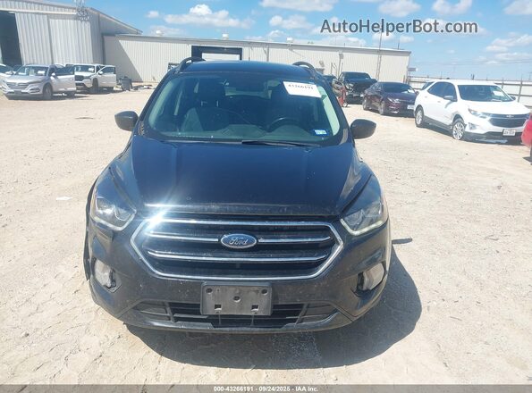 1FMCU9GD2KUB38242 2019 FORD ESCAPE Черный Вид щитка приборов
