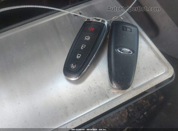 1FMCU9GD2KUB38242 2019 FORD ESCAPE Черный Вид панели приборов
