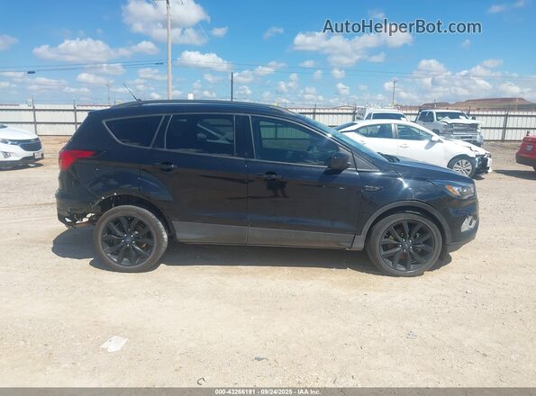 1FMCU9GD2KUB38242 2019 FORD ESCAPE Черный Вид задней части салона
