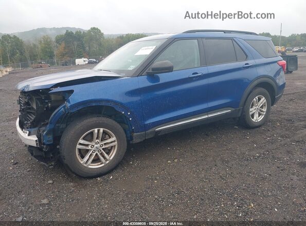 1FMSK8DH7NGC25110 2022 FORD FORD EXPLORER Dark Blue Vista tres cuartos delantera izquierda