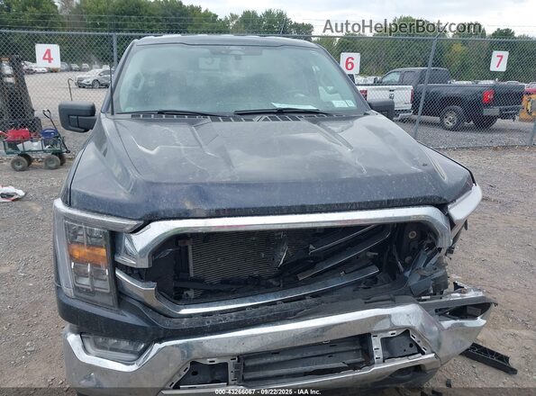 1FTFW1E51NFB55812 2022 FORD F150 Black Widok wnętrza z tyłu