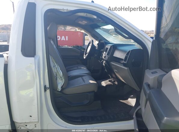 1FTNF1C50LKD79303 2020 FORD F150 Белый Вид салона спереди