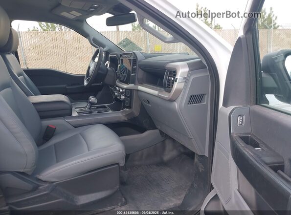 1FTVW1ELXPWG33562 2023 FORD F-150 LIGHTNING White Widok wnętrza z przodu