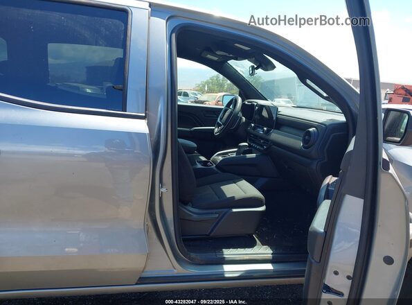 1GCPSBEK9S1138681 2025 CHEVROLET COLORADO Серебряный Вид салона спереди