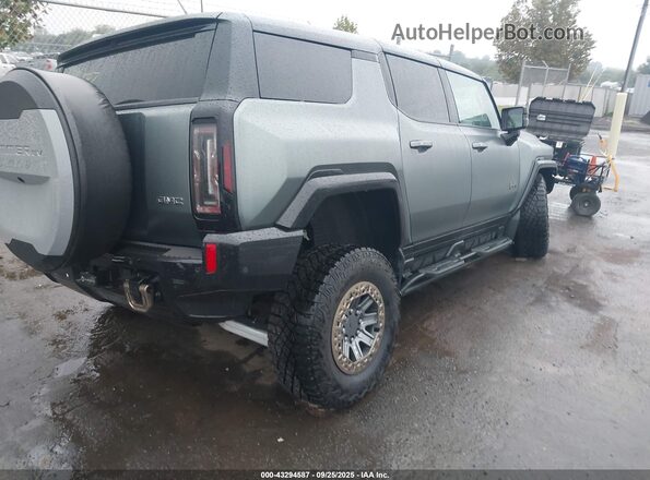 1GKB0RDC4RU102834 2024 GMC HUMMER EV SUV Gray Trasero derecho