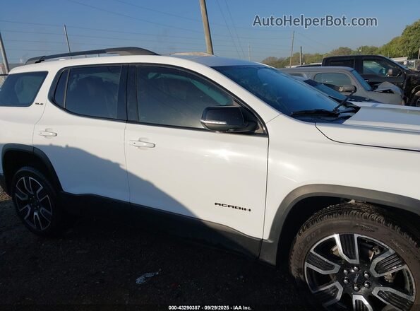 1GKKNKLA9MZ182152 2021 GMC ACADIA White Widok wnętrza z tyłu