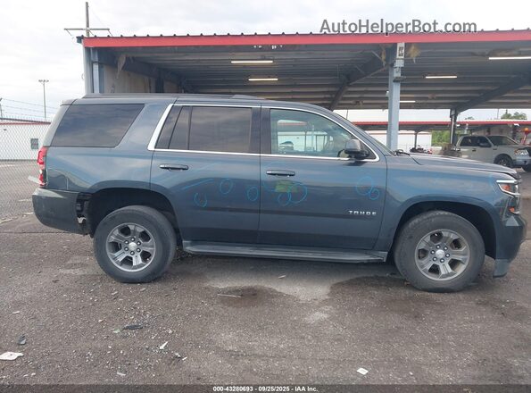 1GNSCAKC7LR135979 2020 CHEVROLET TAHOE Blue Rear interior view
