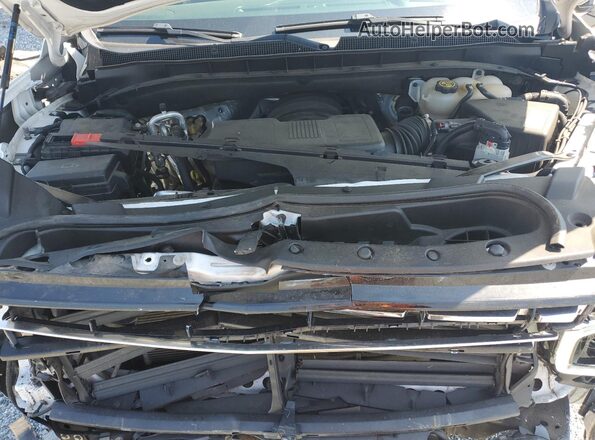1GNSCFKD5MR310138 2021 CHEVROLET SUBURBAN White Vista del compartimento del motor