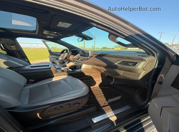 1GNSCNKD0MR124906 2021 CHEVROLET TAHOE Brown Հետևի տեսք