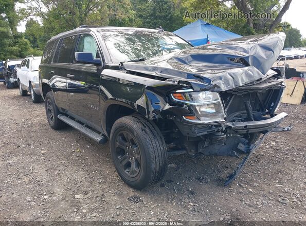 1GNSKAKC1LR309287 2020 CHEVROLET TAHOE Black Вид задньої частини салону
