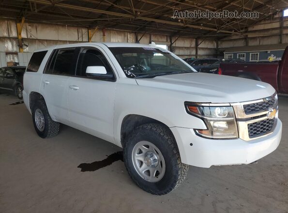 1GNSKFEC5LR140268 2020 CHEVROLET TAHOE White Front right