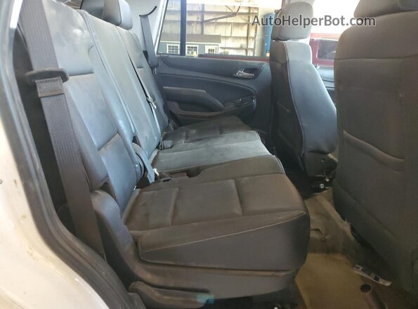 1GNSKFEC5LR140268 2020 CHEVROLET TAHOE White Rear seats view