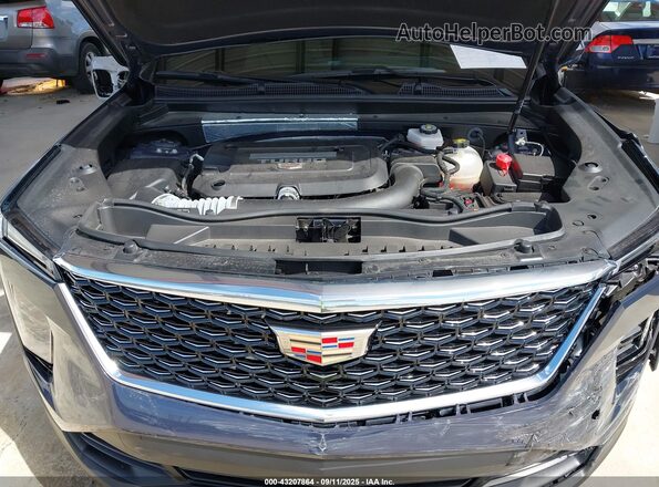 1GYAZAR45RF202276 2024 CADILLAC XT4 Синий Вид сзади