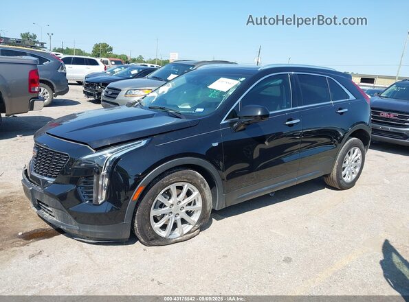 1GYFZBR46MF080970 2021 CADILLAC XT4 Black Front left