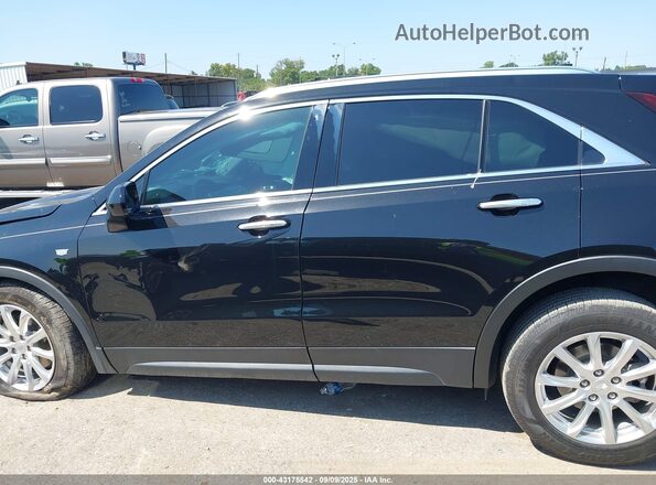 1GYFZBR46MF080970 2021 CADILLAC XT4 Black 360 interior view