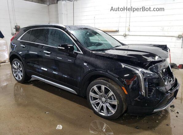 1GYFZDR40PF172303 2023 CADILLAC XT4 Черный Передняя правая четверть