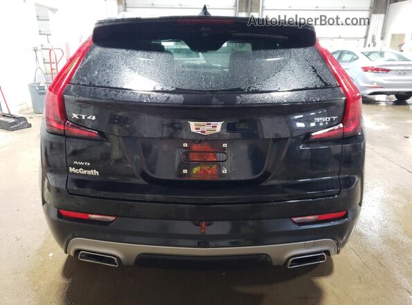 1GYFZDR40PF172303 2023 CADILLAC XT4 Черный Вид сзади