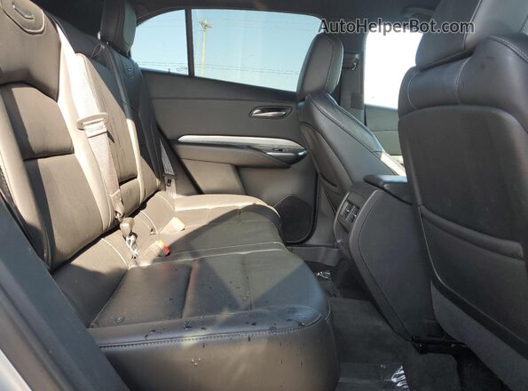1GYFZDR42NF101035 2022 CADILLAC XT4 Silver Vista interior trasera