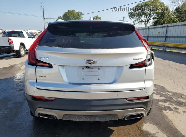 1GYFZDR42NF101035 2022 CADILLAC XT4 Silver Vista trasera