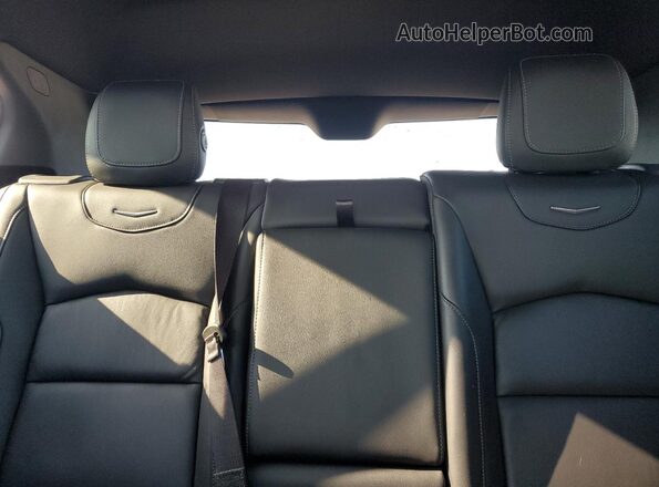 1GYFZDR42NF101035 2022 CADILLAC XT4 Silver Vista de los asientos traseros