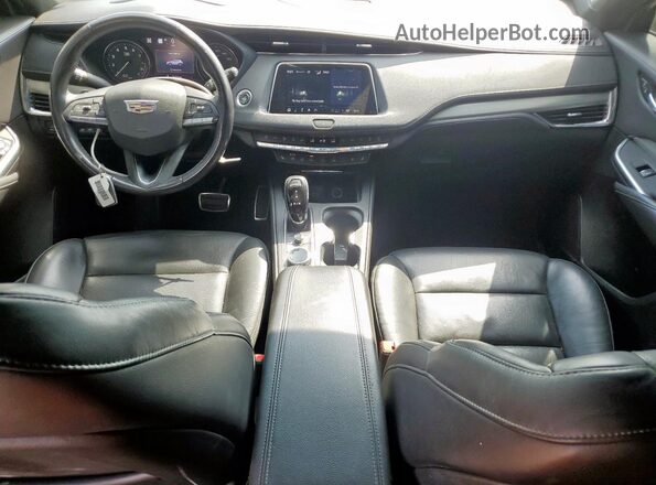 1GYFZDR45PF108385 2023 CADILLAC XT4 Blue Dashboard view