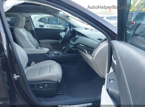 1GYFZDR47LF119818 2020 CADILLAC XT4 Maroon Widok wnętrza z przodu