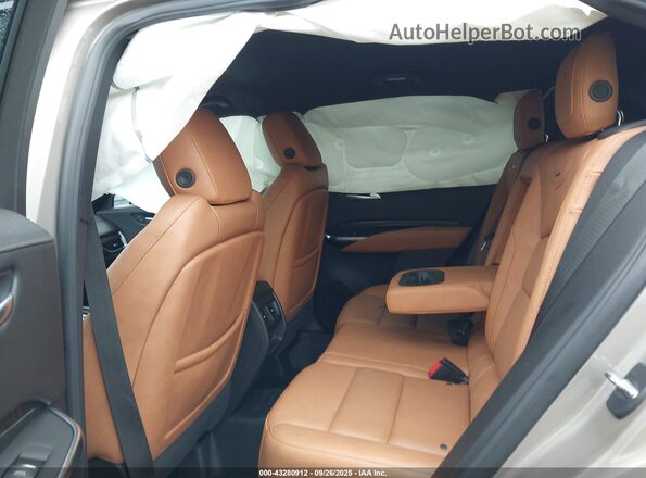 1GYFZDR4XPF124940 2023 CADILLAC XT4 Beige Вид наклейки з VIN-кодом