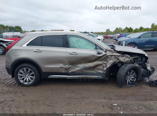 1GYFZDR4XPF124940 2023 CADILLAC XT4 Beige Вид задньої частини салону